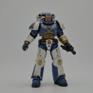 Articulated action figure of a space marine, on a plain white background, even lighting 