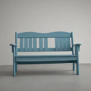 A wide shot of a full-body view, high-quality, highly detailed, photorealistic, cerulean colored Adirondack style bench, with a smooth finish, sitting on a plain white background, with soft natural light, and a slight warm glow, in the style of a product photograph