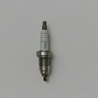 spark plug, on a plain white background, even lighting