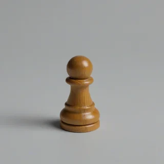 simple pawn game piece, on a plain white background, even lighting