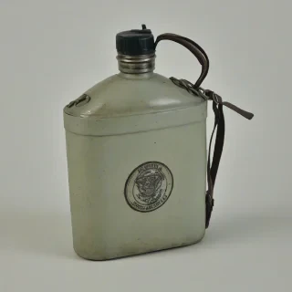 vintage military canteen, on a plain white background, even lighting