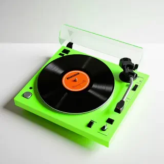 A neon green record player with a record playing on it