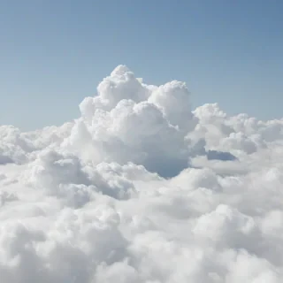 A serene heaven scene with fluffy white clouds, full-body view, on a plain white background
