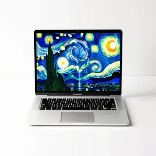 An open laptop with Vincent Van Gogh's Starry Night as the screensaver