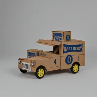 toy derby car made of cardboard boxes, uniform lighting, no background, whole body visible, on a plain white background, uniform lighting, on a plain white background, even lighting