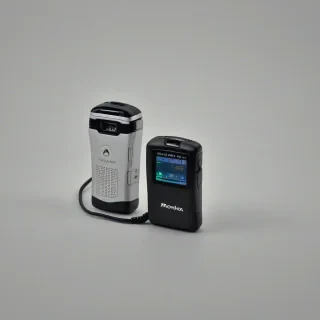 Motorola Talkabout or Twoway pager, on a plain white background, even lighting