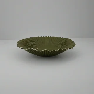 ruffle edge, fluted, matte dark olive green colored, low, wide bowl,, on a plain white background, even lighting