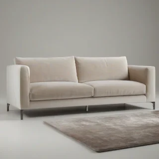 A sleek, modern French contemporary sofa with a minimalist design, featuring a low-back and sleek metal legs, upholstered in a luxurious velvet fabric with a subtle sheen, placed on a plain white background, in a wide shot with the sofa's entire body visible, incorporating a mix of digital art and photography styles, with soft, warm lighting and a shallow depth of field to emphasize the sofa's curves and texture, on a plain white background, even lighting