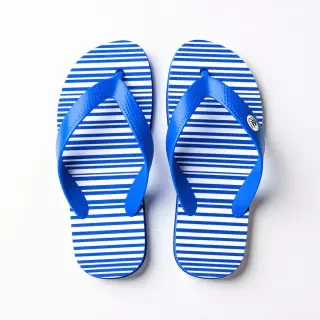 Blue and white vertically striped flip flops
