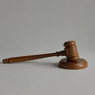 wood gavel, on a plain white background, even lighting