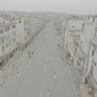 A dull and uninteresting anime city with bored citizens moping around the streets, people wearing plain white clothes, buildings are light grey with no vibrant colors or decorations, full-body view of citizens, wide shot of the city, plain white background, overcast sky, no trees or greenery, no vehicles, no billboards or advertisements, anime style, digital art, low saturation, muted tones, no dynamic lighting, no dramatic shadows, plain and simple architecture, no intricate details, citizens have blank expressions, no smiles, no interactions between people, streets are empty and quiet, no music or sound effects, overall atmosphere is dull and monotonous, on a plain white background