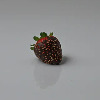 chocolate covered strawberry, on a plain white background, even lighting