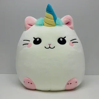 squishmallow stuffed animal, unicorn cat, on a plain white background, even lighting