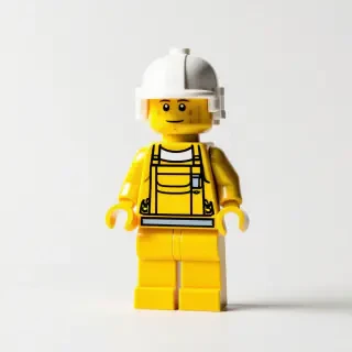 Yellow Lego character wearing a white helmet and an apron