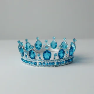 kids toy style, princess crown made of ice blue colored crystals, on a plain white background, even lighting