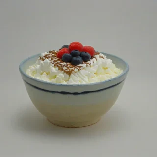 bowl of bingsu, on a plain white background, even lighting