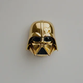 Gold Darth Vader mask, on a plain white background, even lighting