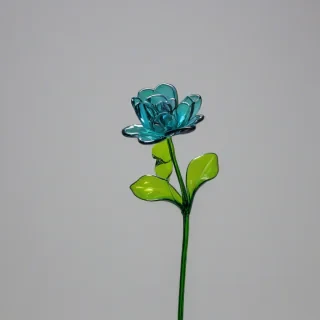 a single flower with stem all made out of colorful glass, on a plain white background, even lighting